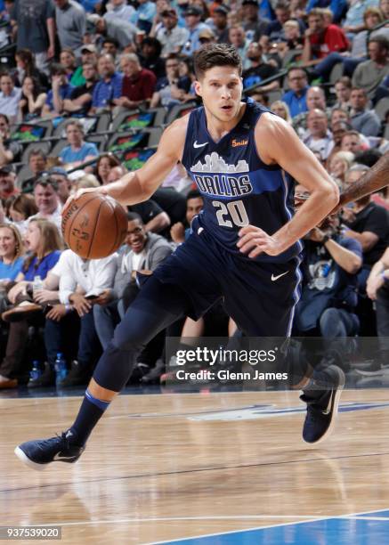 Doug McDermott of the Dallas Mavericks handles the ball against the Charlotte Hornets on March 24, 2018 at the American Airlines Center in Dallas,...