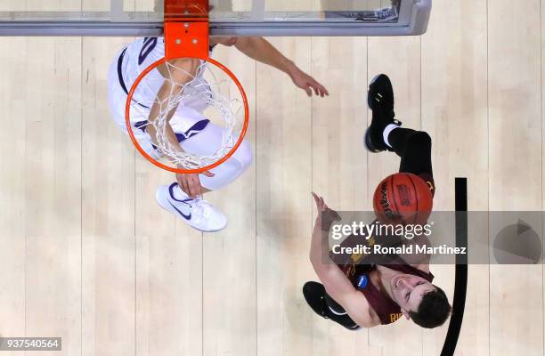 Ben Richardson of the Loyola Ramblers shoots against Mike McGuirl of the Kansas State Wildcats in the second half during the 2018 NCAA Men's...