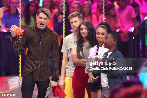 Jace Norman accepts Favorite TV Actor for 'Henry Danger' from Owen Joyner, Lilimar Hernandez and Daniella Perkins onstage at Nickelodeon's 2018 Kids'...