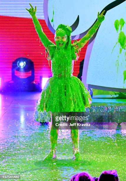 JoJo Siwa reacts after getting 'slimed' onstage at Nickelodeon's 2018 Kids' Choice Awards at The Forum on March 24, 2018 in Inglewood, California.