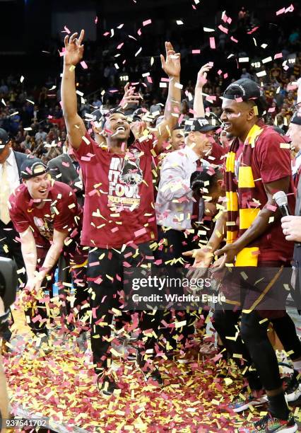 The Loyola Ramblers celebrate after defeating Kansas State, 78-62, in an NCAA Tournament regional final at Philips Arena in Atlanta on Saturday,...