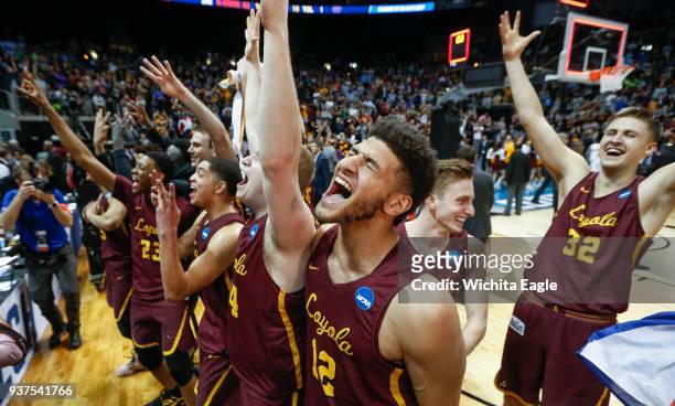 Loyola guard Lucas Williamson celebrates after defeating Kansas State, 78-62, in an NCAA Tournament regional final at Philips Arena in Atlanta on...