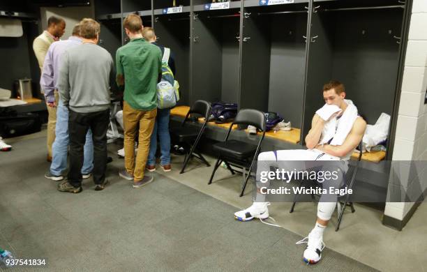 Kansas State guard Mason Schoen sits alone in the locker room after a 78-62 loss against Loyola in an NCAA Tournament regional final at Philips Arena...