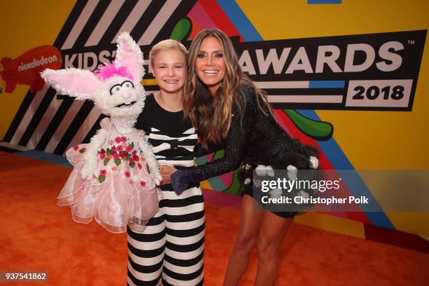 Darci Lynne Farmer and Heidi Klum attend Nickelodeon's 2018 Kids' Choice Awards at The Forum on March 24, 2018 in Inglewood, California.