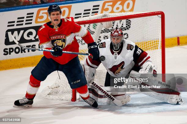 Goaltender Darcy Kuemper of the Arizona Coyotes defends the net against Nick Bjugstad of the Florida Panthers at the BB&T Center on March 24, 2018 in...