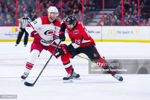 Ottawa Senators Center Zack Smith skates by Carolina Hurricanes Center Jordan Staal during second period National Hockey League action between the...