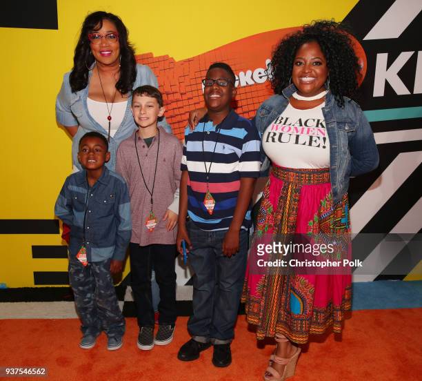 Kym Whitley, Joshua Kaleb Whitley, Jeffrey Charles Tarpley and Sherri Shepherd attend Nickelodeon's 2018 Kids' Choice Awards at The Forum on March...