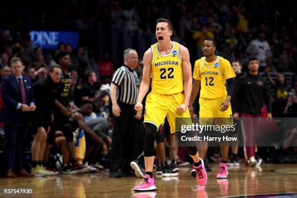 Duncan Robinson of the Michigan Wolverines reacts in the second half while taking on the Florida State Seminoles in the 2018 NCAA Men's Basketball...