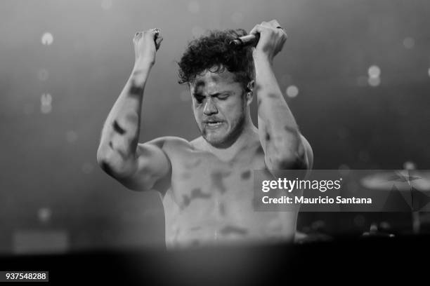 Dan Reynolds singer member of the band Imagine Dragons performs live on stage during the second day of Lollapalooza Brazil Festival at Interlagos...