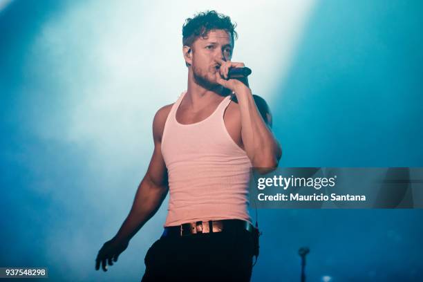 Dan Reynolds singer member of the band Imagine Dragons performs live on stage during the second day of Lollapalooza Brazil Festival at Interlagos...