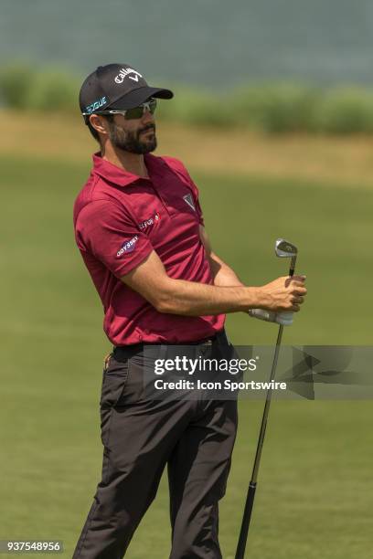Adam Hadwin watches his ball fall close to the pin on the par four fourteenth hole during the WGC-Dell Technologies Match Play Tournament on March 22...