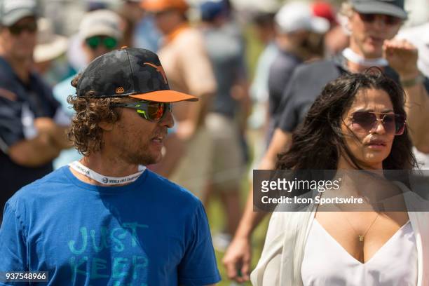 Matthew McConaughey and his wife Camila Alves watch Dustin Johnson and Adam Hadwin play during the WGC-Dell Technologies Match Play Tournament on...