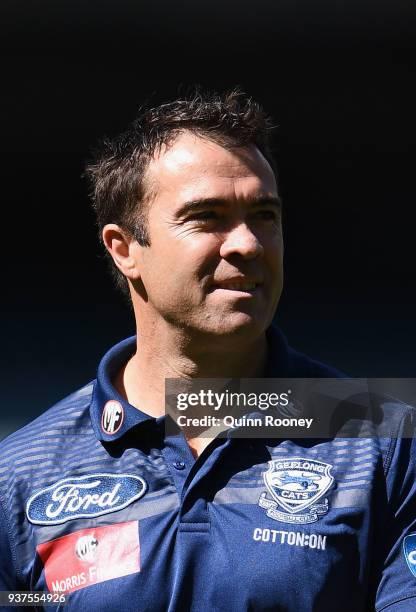 Cats head coach Chris Scott looks on during the round one AFL match between the Melbourne Demons and the Geelong Cats at Melbourne Cricket Ground on...