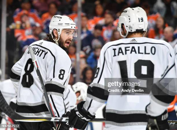 Drew Doughty and Alex Iafallo of the Los Angeles Kings discuss the play during the game against the Edmonton Oilers on March 24, 2018 at Rogers Place...