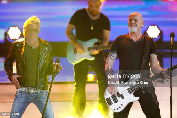 Matthias Reim and the band Santiano perform during the tv show 'Willkommen bei Carmen Nebel' on March 24, 2018 in Hof, Germany. The show will be...