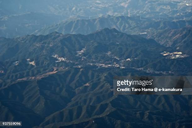 a holy town on mt. koya (koyasan) in wakayama prefecture in japan daytime aerial view from airplane - koya san stock pictures, royalty-free photos & images