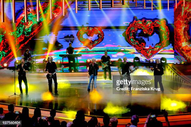 Matthias Reim and the band Santiano perform during the tv show 'Willkommen bei Carmen Nebel' on March 24, 2018 in Hof, Germany. The show will be...
