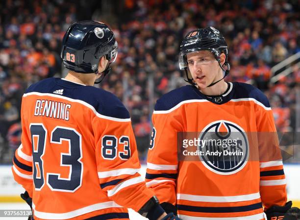 Matthew Benning and Ryan Strome of the Edmonton Oilers discuss the play during the game against the Los Angeles Kings on March 24, 2018 at Rogers...