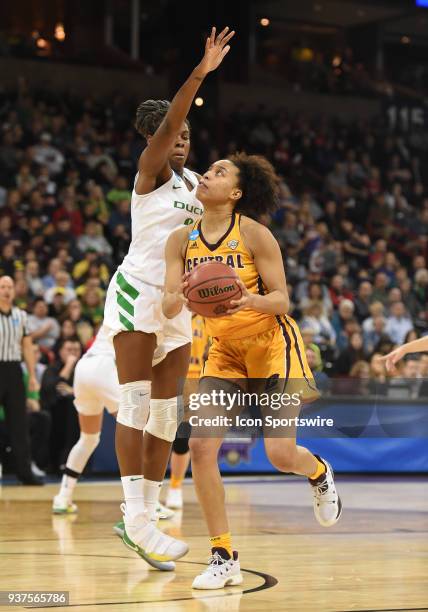 Central Michigan forward Tinara Moore looks to score on Oregon forward Ruthy Hebard during a Division I Women's Championship, Third Round game...