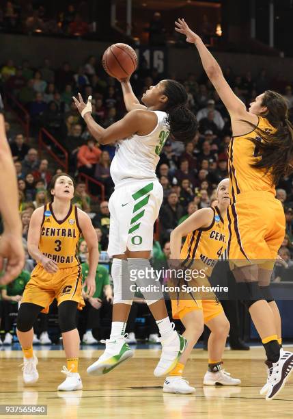 Oregon forward Oti Gildon scores on this reverse-layup during a Division I Women's Championship, Third Round game between the Central Michigan...