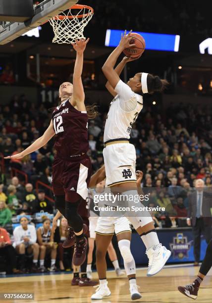 Notre Dame forward Danielle Patterson scores over Texas A&M guard Danni Williams during the 1st half of a Division I Women's Championship, Third...