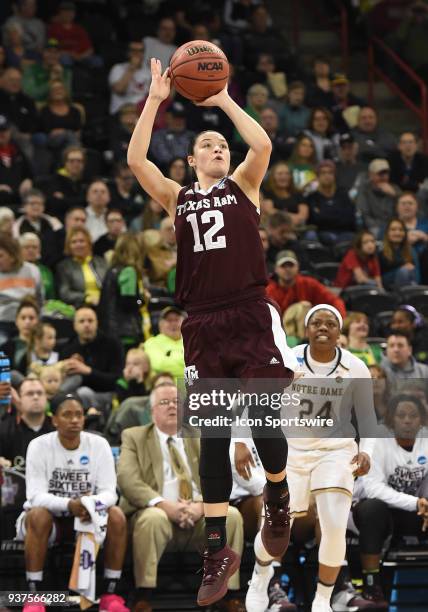 Texas A&M guard Danni Williams puts up a jumper during the 2nd half of a Division I Women's Championship, Third Round game between the Texas A&M...