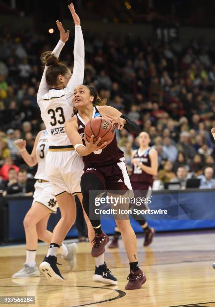 Texas A&M guard Chennedy Carter drives past Notre Dame forward Kathryn Westbeld during the 2nd half of a Division I Women's Championship, Third Round...