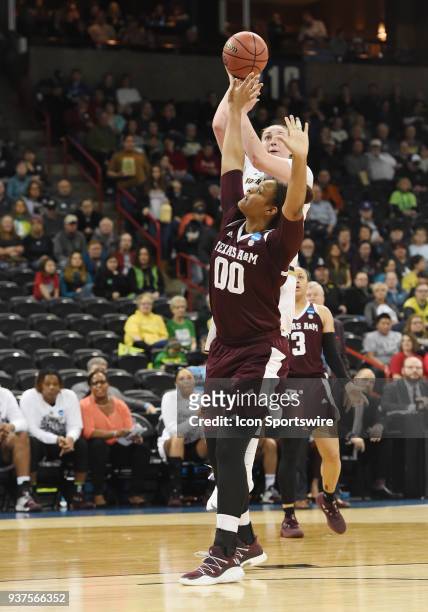 Notre Dame forward Jessica Shepard shoots over Texas A&M center Khaalia Hillsman during the 1st half of a Division I Women's Championship, Third...