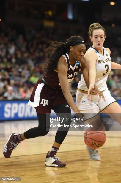 Texas A&M guard/forward Jasmine Lumpkin and Notre Dame guard Marina Mabrey battle for the ball during the 2nd half of a Division I Women's...