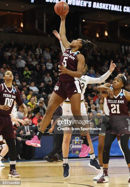 Texas A&M forward Anriel Howard goes up to grab a rebound during the 1st half of a Division I Women's Championship, Third Round game between the...