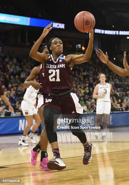 Texas A&M guard/forward Jasmine Lumpkin can't control this pass during the 1st half of a Division I Women's Championship, Third Round game between...