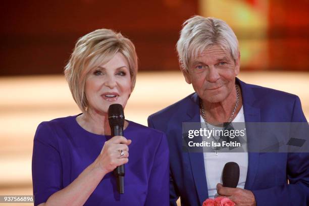 German presenter Carmen Nebel and German singer Matthias Reim during the tv show 'Willkommen bei Carmen Nebel' on March 24, 2018 in Hof, Germany. The...