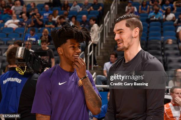 Elfrid Payton of the Phoenix Suns and Mario Hezonja of the Orlando Magic talk before the game on March 24, 2018 at Amway Center in Orlando, Florida....