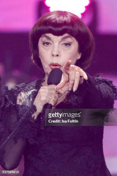 French singer Mireille Mathieu performs during the tv show 'Willkommen bei Carmen Nebel' on March 24, 2018 in Hof, Germany. The show will be aired on...