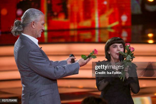 French singer Mireille Mathieu and US actor Patrick Duffy during the tv show 'Willkommen bei Carmen Nebel' on March 24, 2018 in Hof, Germany. The...