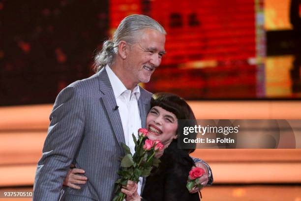 French singer Mireille Mathieu and US actor Patrick Duffy during the tv show 'Willkommen bei Carmen Nebel' on March 24, 2018 in Hof, Germany. The...