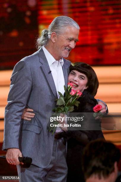 French singer Mireille Mathieu and US actor Patrick Duffy during the tv show 'Willkommen bei Carmen Nebel' on March 24, 2018 in Hof, Germany. The...