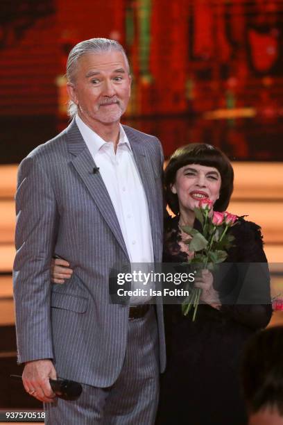 French singer Mireille Mathieu and US actor Patrick Duffy during the tv show 'Willkommen bei Carmen Nebel' on March 24, 2018 in Hof, Germany. The...