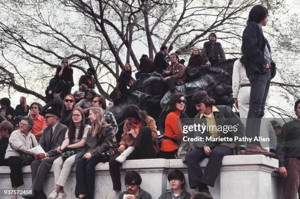 Washington, District of Columbia, USA - 1970s : A group of people sit and stand on the Charging Cavalry section of the Ulysses S. Grant Memorial in...