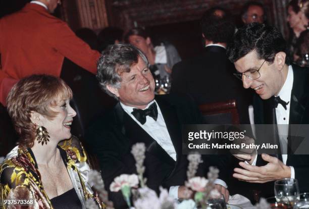 New York, New York, USA Actress Shirley MacLaine and Senator Edward M Kennedy of Massachusetts laugh at a story being told by composer Marvin...