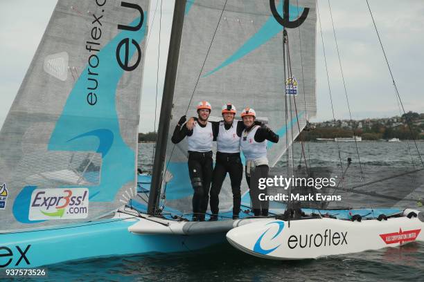 The Euroflex crew of Nathan Outteridge, Glenn Ashby and Lachie Gilmore celebrate winning the Grand Final during the Super Foilers Grand Prix at...