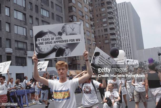 New York, New York, USA - Sunday, June 25, 1989: Marchers at the Lesbian and Gay Pride Parade, Sunday, June 25, 1989 in New York, New York, USA carry...