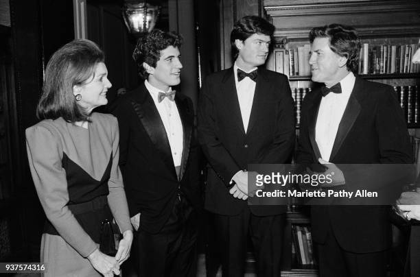 New York, New York, USA Jacqueline Kennedy Onassis, John F Kennedy Jr, Jeff Ledbetter, Gary Hart pose talking at a Democratic Fundraiser held at the...