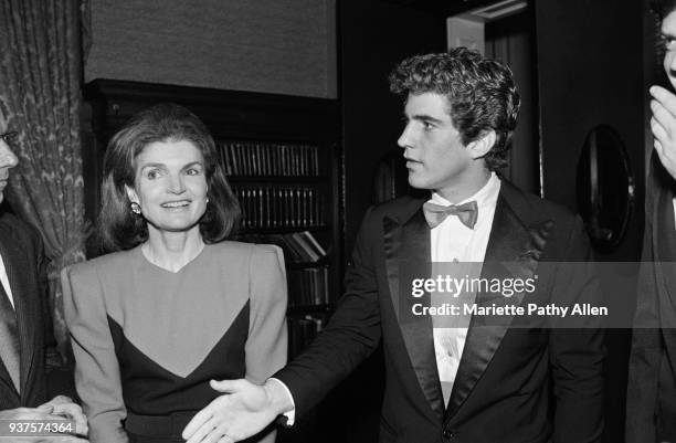 New York, New York, USA Jacqueline Kennedy Onassis, and her son, John F Kennedy Jr socialize at the New York City Metropolitan Club Democratic...