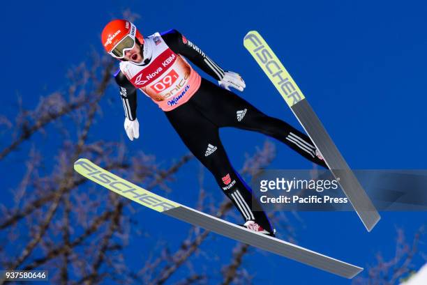Markus Eisenbichler of Germany soars through the air during the team competition at Planica FIS Ski Jumping World Cup finals.