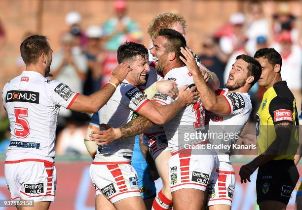 Paul Vaughan of the Dragons celebrates scoring a try during the round three NRL match between the Gold Coast Titans and the St George Illawarra...
