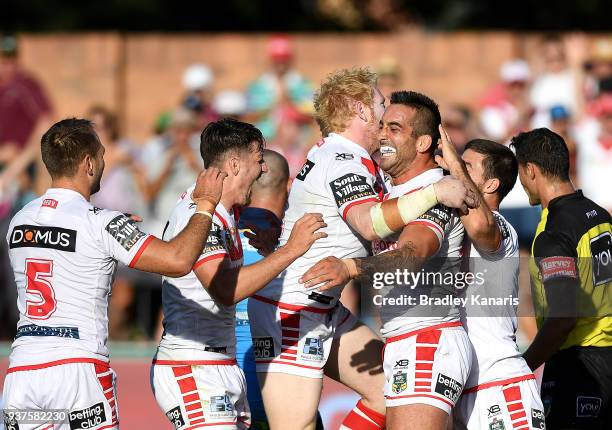 Paul Vaughan of the Dragons celebrates scoring a try during the round three NRL match between the Gold Coast Titans and the St George Illawarra...