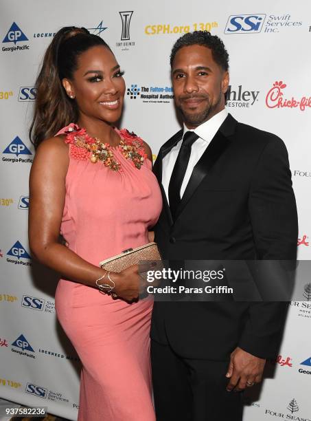 Personality Kenya Moore and Marc Daly attend Carrie Steele-Pitts Home 130th Anniversary Gala at Four Seasons Hotel on March 24, 2018 in Atlanta,...