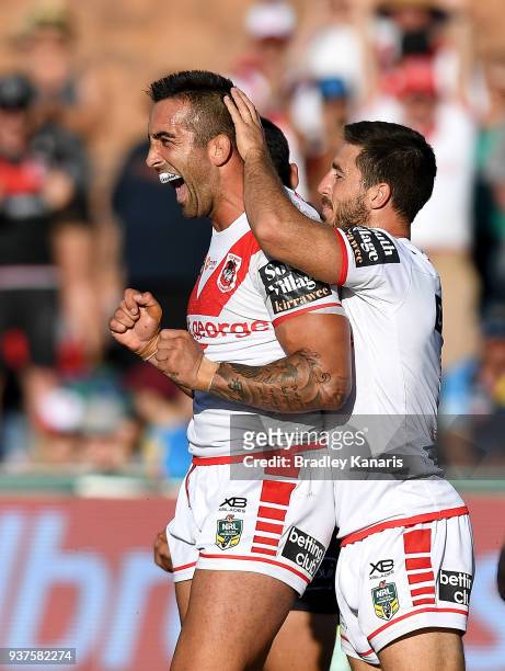 Paul Vaughan of the Dragons celebrates scoring a try during the round three NRL match between the Gold Coast Titans and the St George Illawarra...