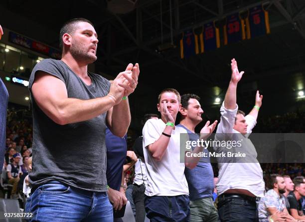 Brendan Fevola cheers on Melbourne during game four of the NBL Grand Final series between the Adelaide 36ers and Melbourne United at Priceline...